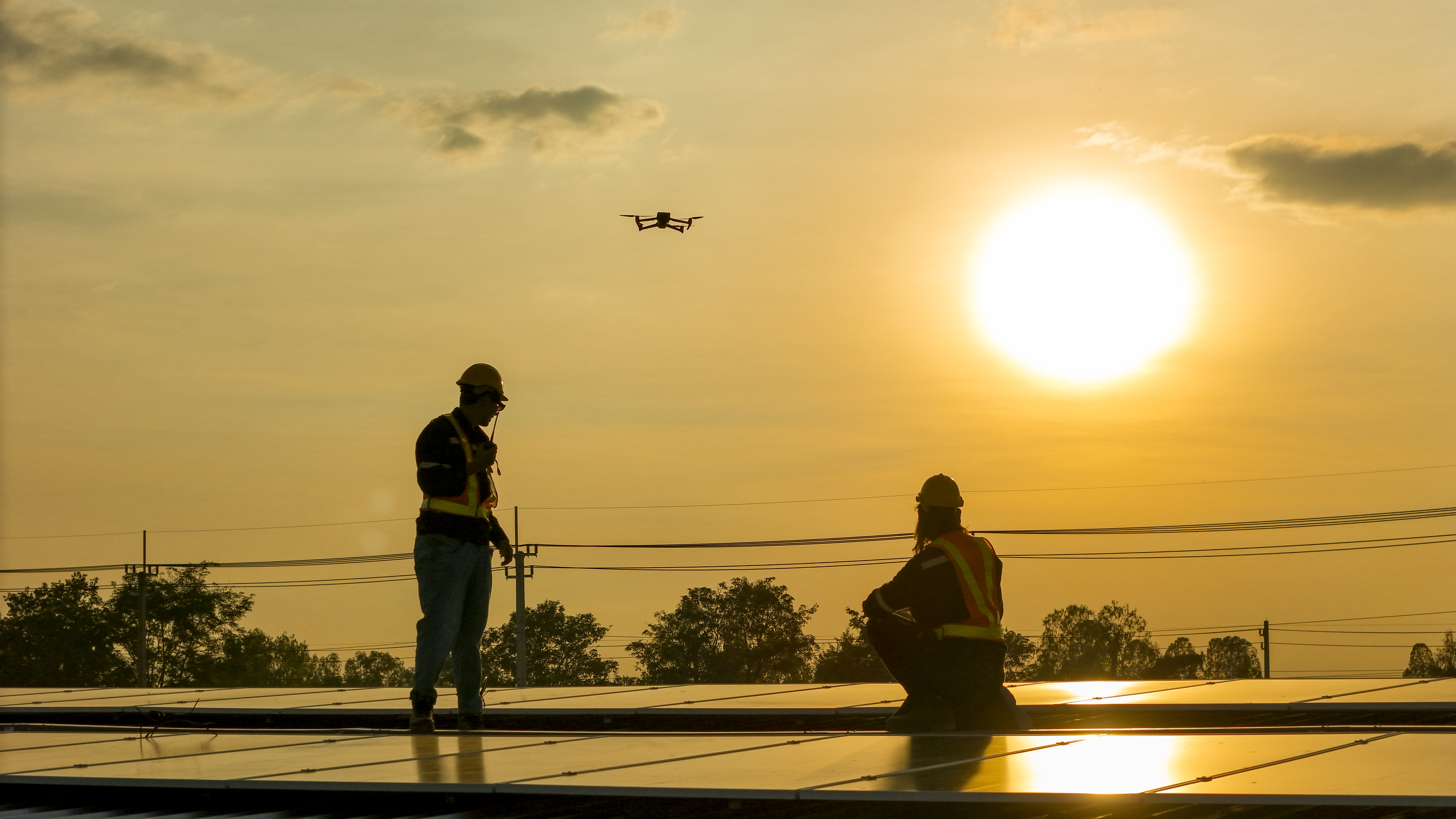 Solar technician installing panels